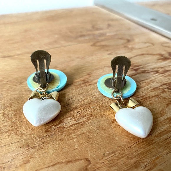 Redesigned blue opalescent clip on earrings with bow and faux pearl heart dangle - Picture 13 of 13